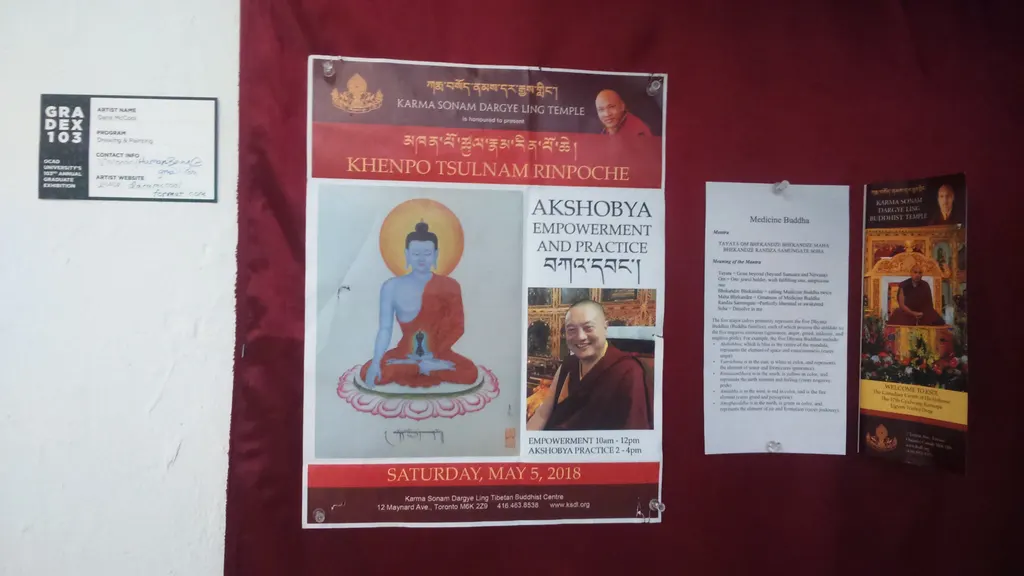 The Akshobya empowerment poster on the gallery wall